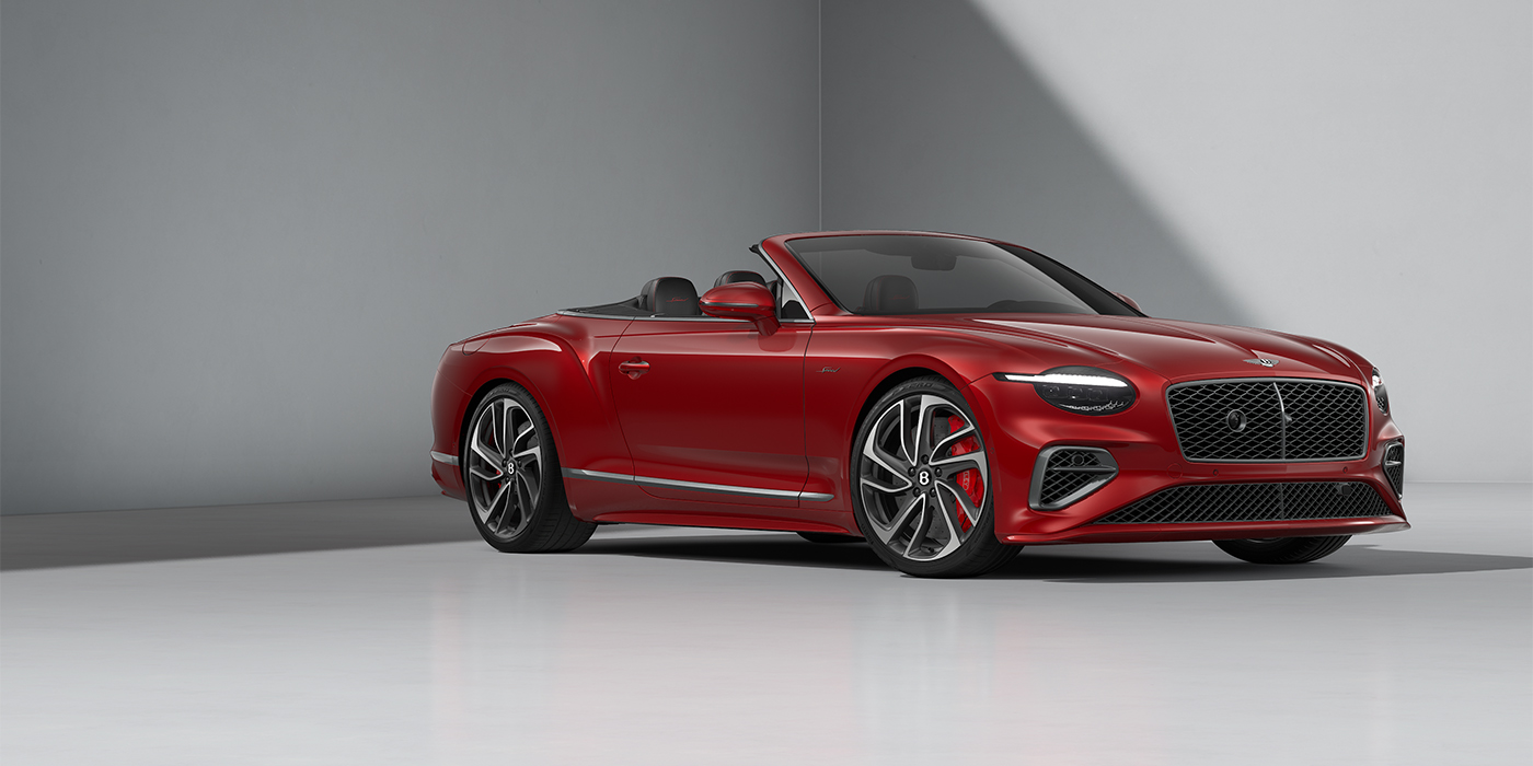 Thomas Exclusive Cars GmbH Bentley Continental GTC Speed convertible in Dragon Red paint and 22" swept spoke wheels - front 3/4