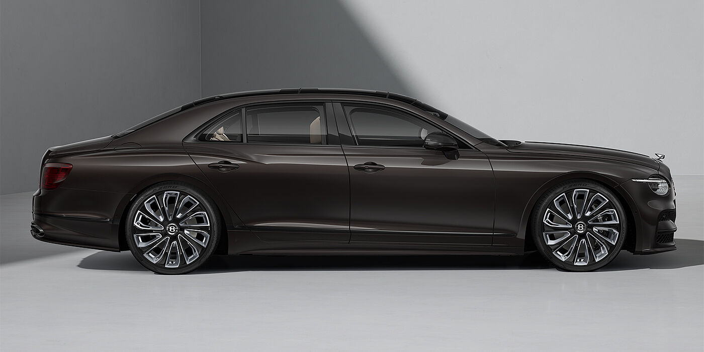Thomas Exclusive Cars GmbH New Bentley Flying Spur Mulliner sedan in Havana brown paint profile with 22" Mulliner Black Painted & Polished wheels