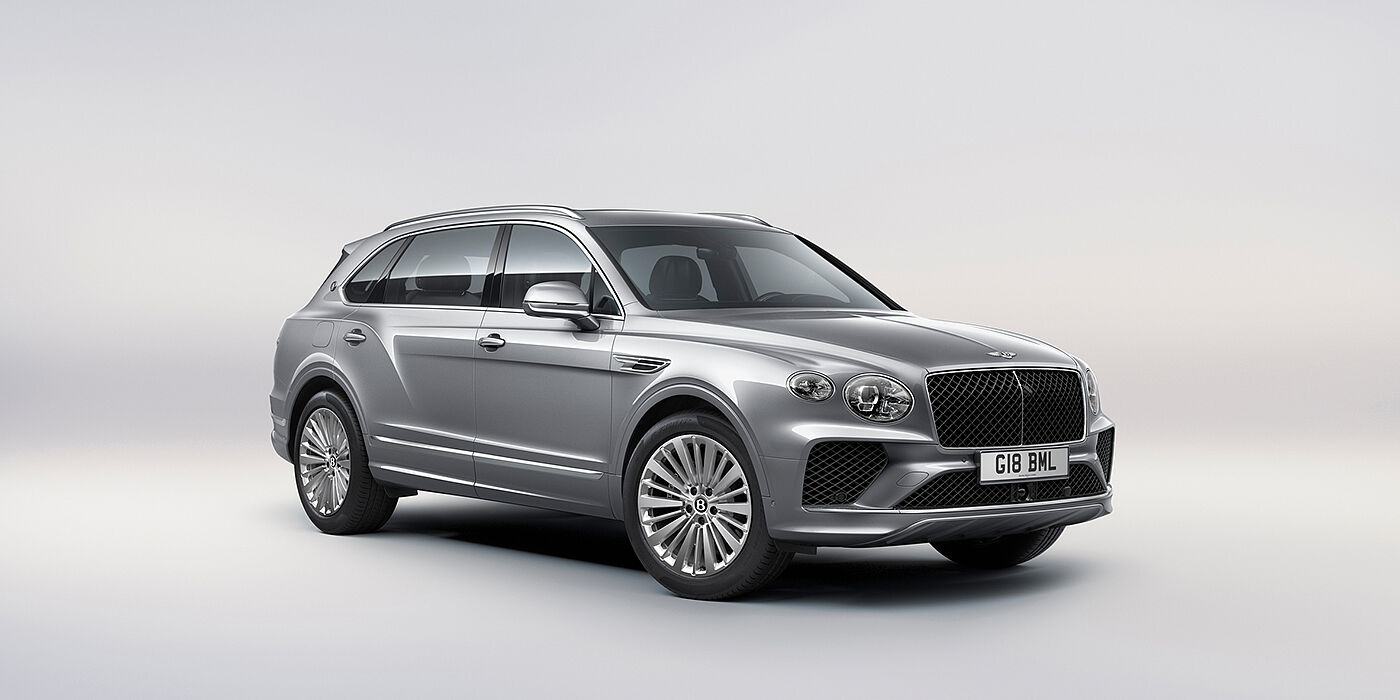 Thomas Exclusive Cars GmbH Bentley Bentayga Extended Wheelbase luxury SUV front three quarter view in Moonbeam paint with 21 inch five spoke painted wheels