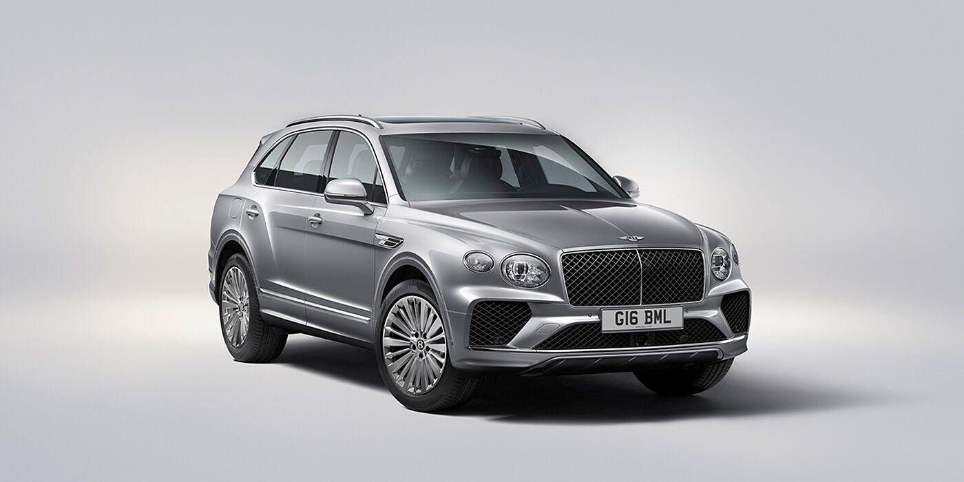 Thomas Exclusive Cars GmbH Bentley Bentayga luxury SUV front three quarter view in Moonbeam paint with matrix grille and 21″ 5 spoke painted wheels