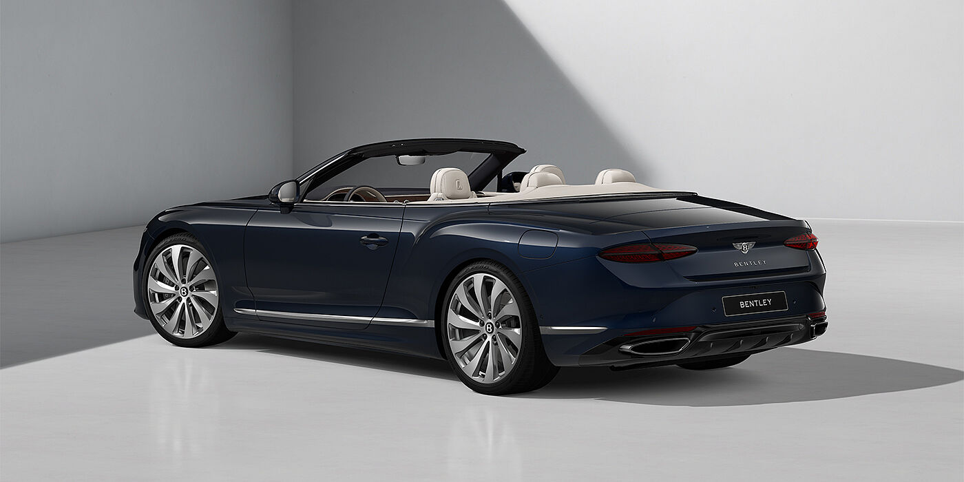 Thomas Exclusive Cars GmbH Bentley Continental GTC convertible in Dark Sapphire paint and 22" Ten Spoke wheels - rear 3/4