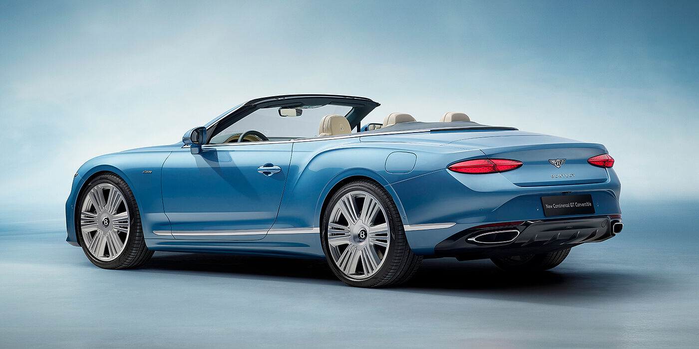 Thomas Exclusive Cars GmbH New Bentley Continental GTC Azure convertible rear view in Light Windsor blue paint with 22 inch ten spoke wheels and chrome exterior details