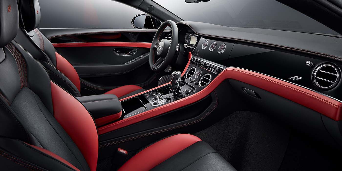 Thomas Exclusive Cars GmbH Bentley Continental GT S coupe front interior in Beluga black and Hotspur red hide with high gloss Carbon Fibre veneer