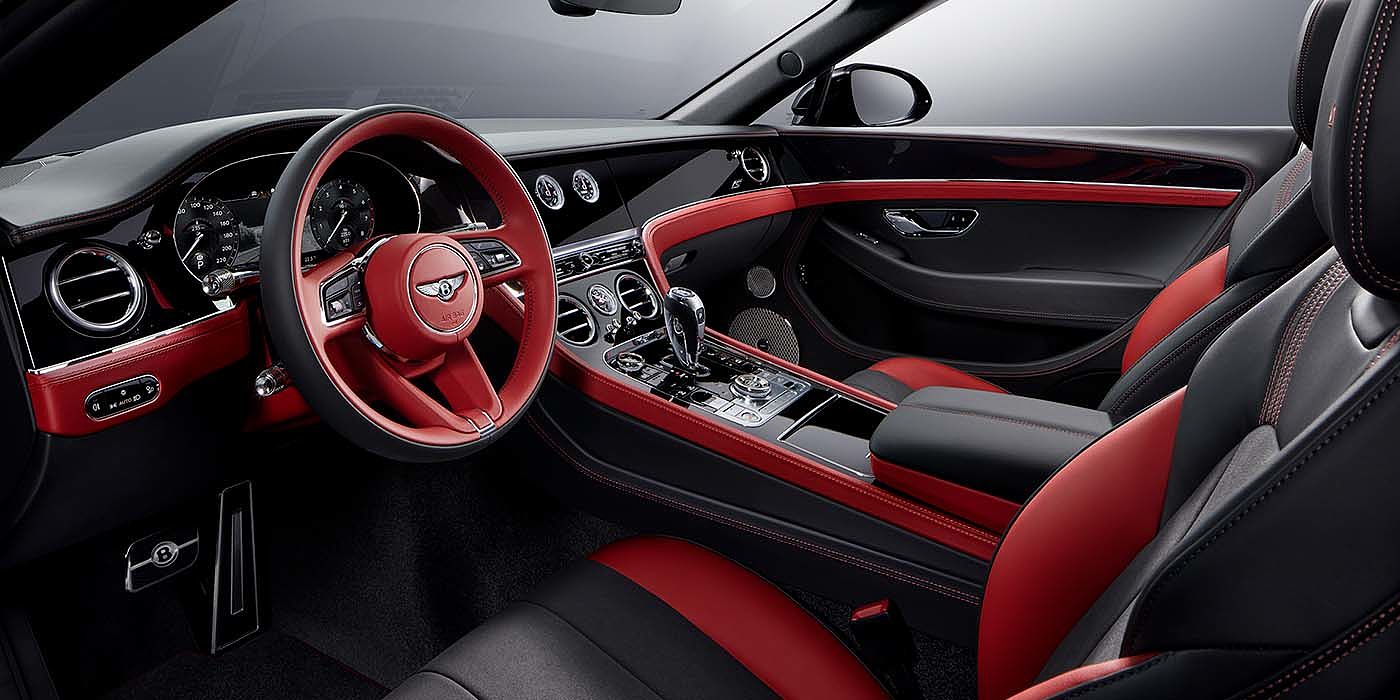 Thomas Exclusive Cars GmbH Bentley Continental GTC S convertible front interior in Beluga black and Hotspur red hide with high gloss carbon fibre veneer