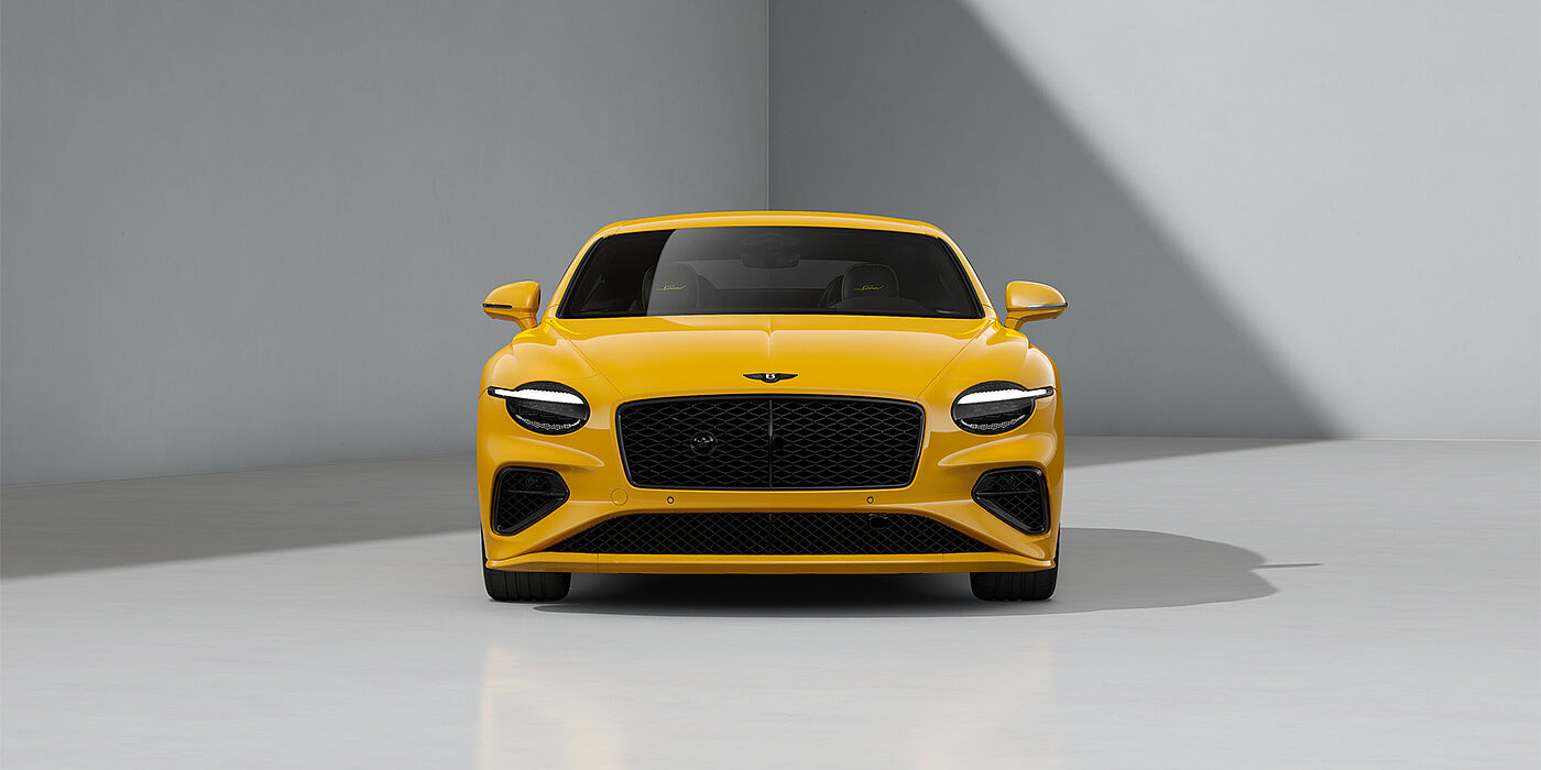 Thomas Exclusive Cars GmbH Bentley Continental GT Speed coupe in Monaco Yellow paint and 22" Ten spoke sport wheels - full front