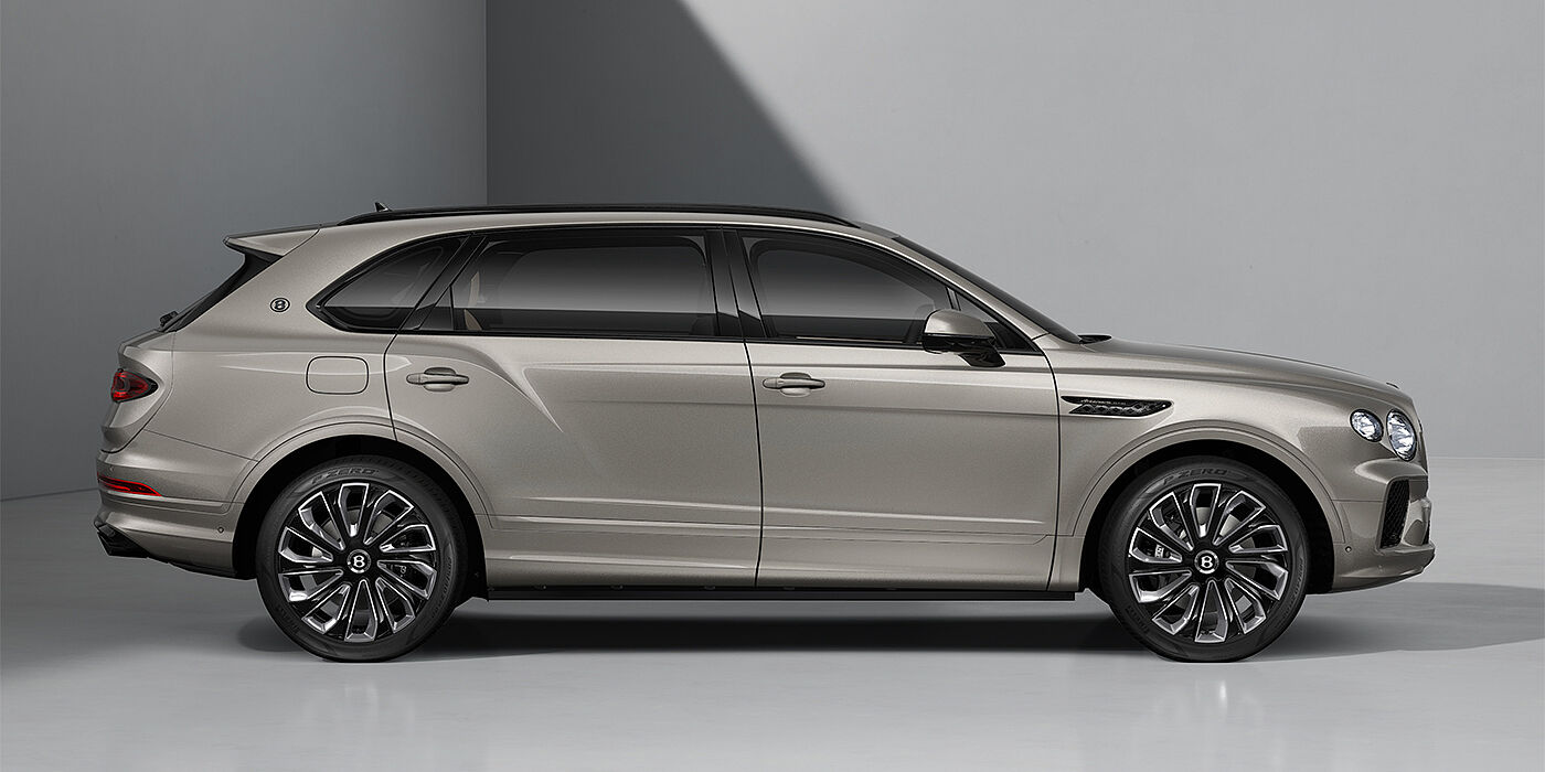 Thomas Exclusive Cars GmbH Bentayga EWB Artenara Edition SUV in Pale Brodgar paint with 22" Mulliner Gloss black wheel profile