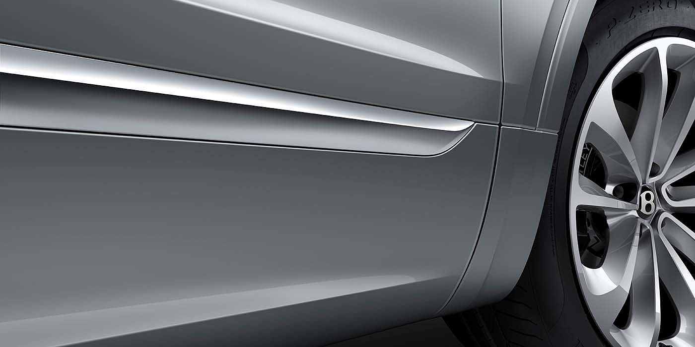 Thomas Exclusive Cars GmbH Bentley Bentayga EWB SUV exterior and wheel close up in Moonbeam paint