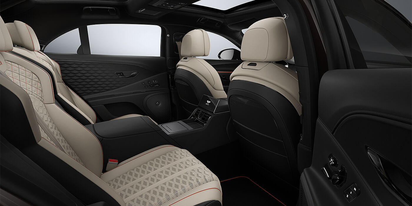 Thomas Exclusive Cars GmbH New Bentley Flying Spur Mulliner sedan rear interior in Portland and Beluga Black hides with Grand Black veneer
