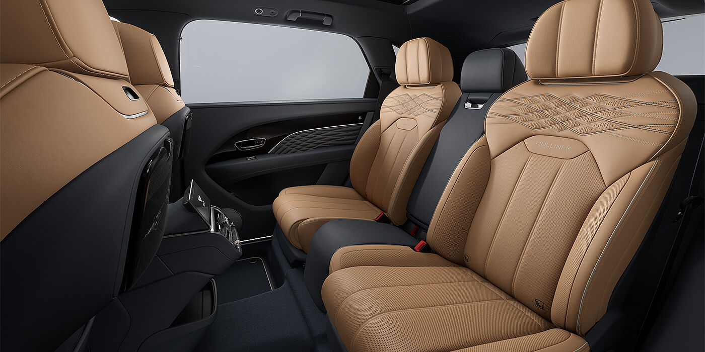 Thomas Exclusive Cars GmbH Bentley Bentayga EWB Mulliner SUV rear interior in Camel and Brunel hides with Mulliner contrast stitching