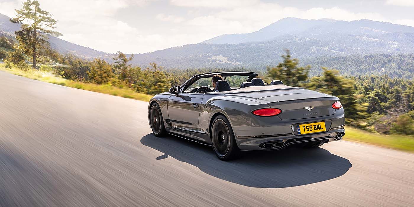 Thomas Exclusive Cars GmbH Bentley Continental GTC S convertible in Cambrian Grey paint rear 34 dynamic driving