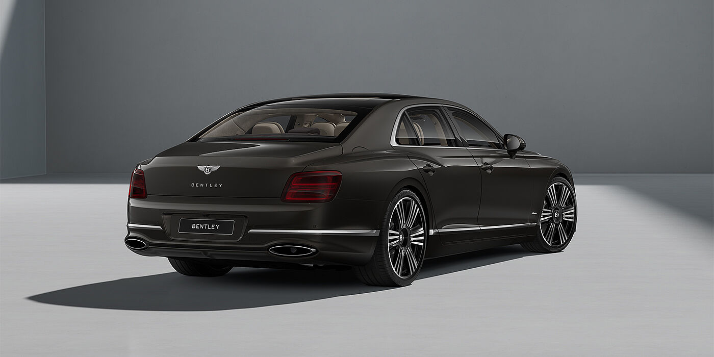Thomas Exclusive Cars GmbH New Bentley Flying Spur Azure sedan in Spectre paint rear 3/4 with 22" Azure Black & Machined wheels