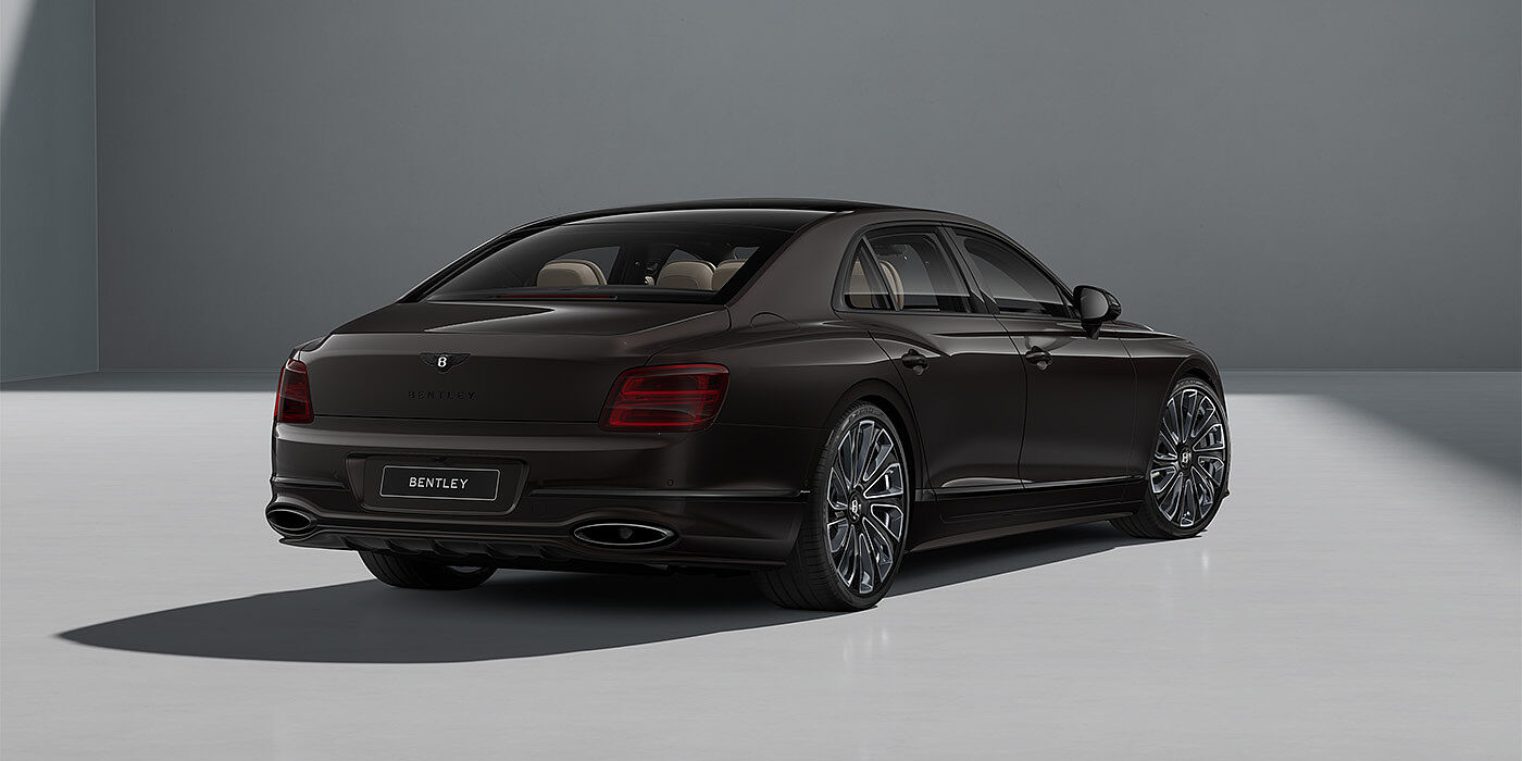 Thomas Exclusive Cars GmbH New Bentley Flying Spur Mulliner sedan in Havana brown paint rear 3/4 with 22" Mulliner Black Painted & Polished wheels