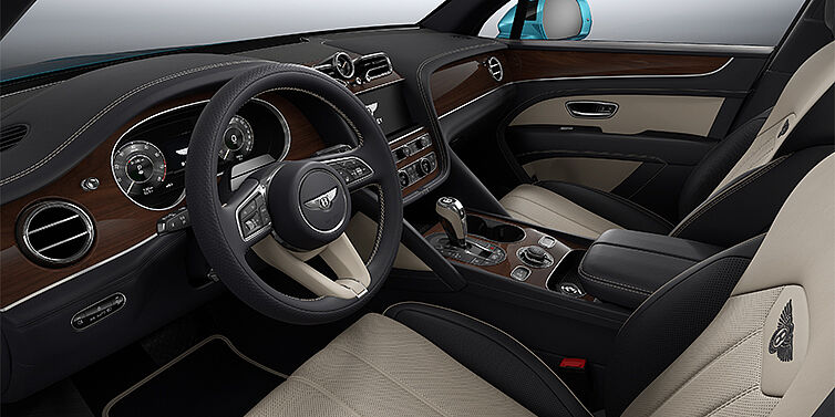 Thomas Exclusive Cars GmbH Bentley Bentayga EWB SUV front interior in Portland and Imperial Blue hides with Crown Cut Walnut veneer