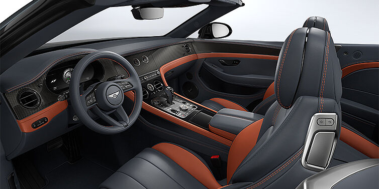 Thomas Exclusive Cars GmbH Bentley Continental GTC S convertible interior in Newmarket Tan and Beluga Black hides with Carbon Fibre veneer