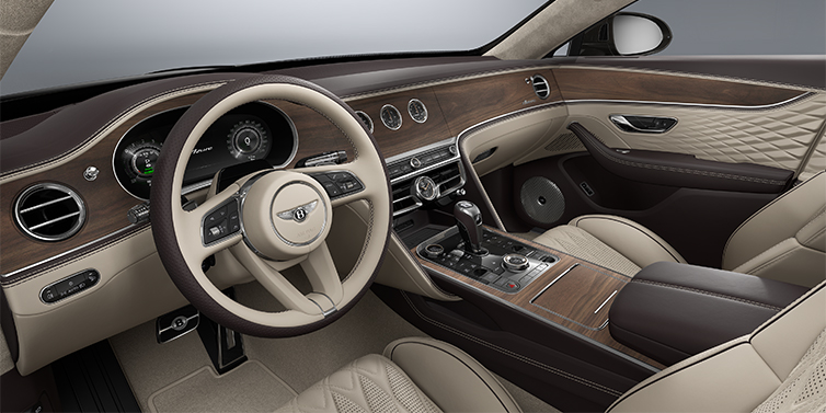 Thomas Exclusive Cars GmbH New Bentley Flying Spur Azure sedan front interior in Portland and Burnt Oak hides with Open Pore Crown Cut Walnut veneer