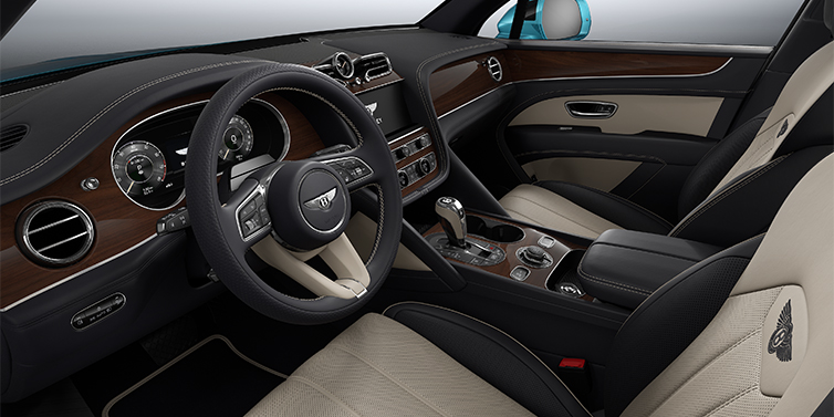 Thomas Exclusive Cars GmbH Bentley Bentayga EWB SUV front interior in Portland and Imperial Blue hides with Crown Cut Walnut veneer