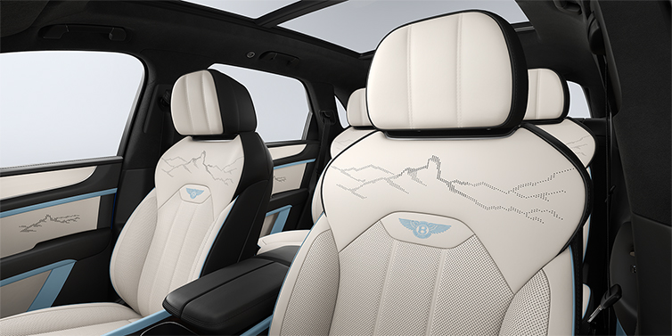 Thomas Exclusive Cars GmbH Bentley Bentayga Artenara Edition SUV front seats in Linen and Beluga Black hides with Light Blue accents and Artenara stitch detail