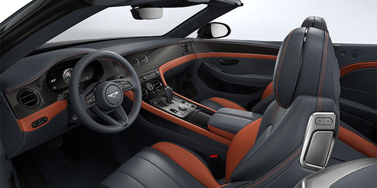 Thomas Exclusive Cars GmbH Bentley Continental GTC S convertible interior in Newmarket Tan and Beluga Black hides with Carbon Fibre veneer