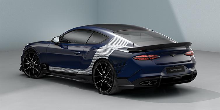 Thomas Exclusive Cars GmbH Bentley Supersports rear three quarter in "Skies" Design theme with Electric Blue paint finish and Arctica white and Oxford blue paint stripes across the rear haunch.