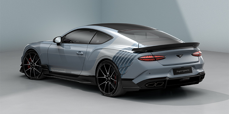 Thomas Exclusive Cars GmbH Bentley Supersports rear three quarter in "Daybreak" Design theme with Jetstream blue paint and Arctica white and Portofino blue paint stripes across the rear haunch.