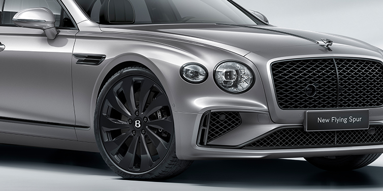 Thomas Exclusive Cars GmbH New Bentley Flying Spur sedan front bonnet in Silverlake paint with Black Specification with black ten spoke wheel, black matrix grille and black exterior details