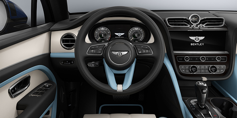 Thomas Exclusive Cars GmbH Bentley Bentayga Artenara Edition SUV steering wheel view in Linen and Beluga Black hides with Light Blue accents and Piano Linen veneer