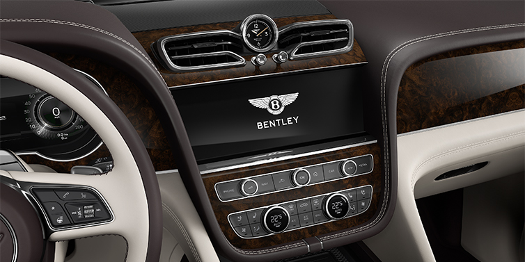 Thomas Exclusive Cars GmbH Bentley Bentayga EWB Azure SUV centre console detail showing Bentley Wings