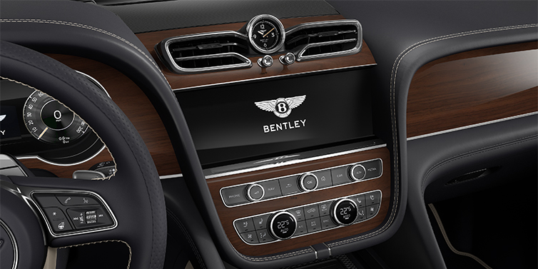 Thomas Exclusive Cars GmbH Bentley Bentayga EWB SUV centre console detail showing Bentley Wings
