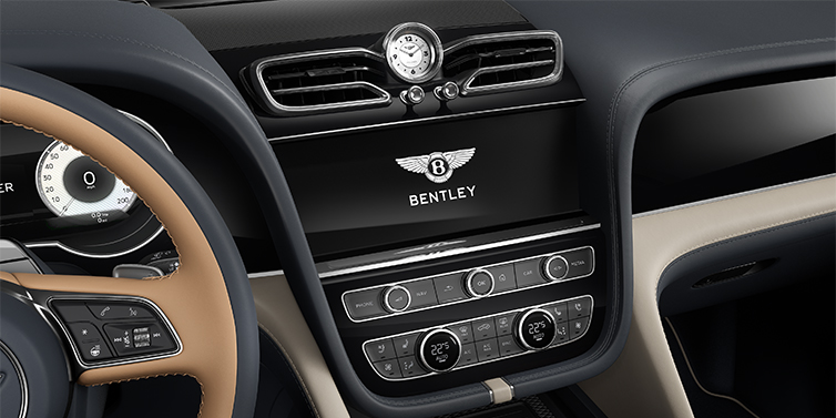 Thomas Exclusive Cars GmbH Bentley Bentayga EWB Mulliner SUV centre console detail showing Bentley Wings