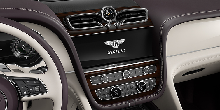 Thomas Exclusive Cars GmbH Bentley Bentayga Azure SUV centre console detail showing Bentley Wings